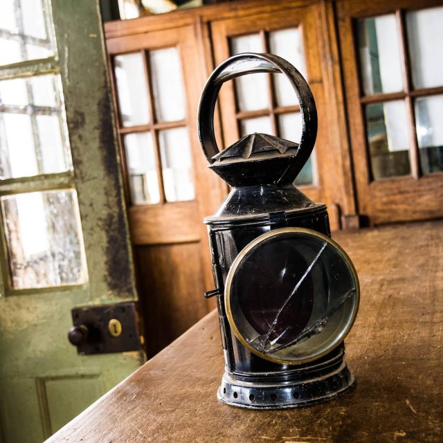 Railway signalling lamp at Konza station - One of the few stations between Mombasa and Nairobi that was still in operation at the time (2015).
In the second image, Konza station master demonstrates how the lamp would have been used to signal train drivers at night.